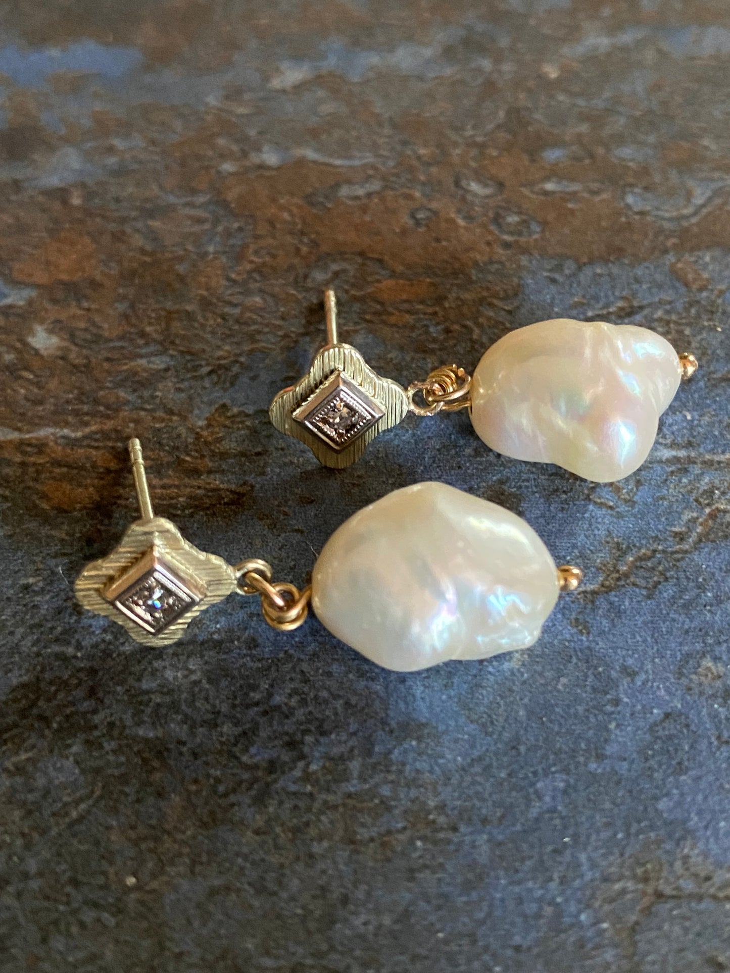 antique golden earrings with pearl and diamant setting