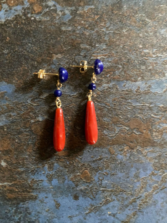 golden earrings with a coral drop and lapis beads